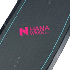 Detail of the HANA Carver wakeboard deck with HANA Wake Co. logo