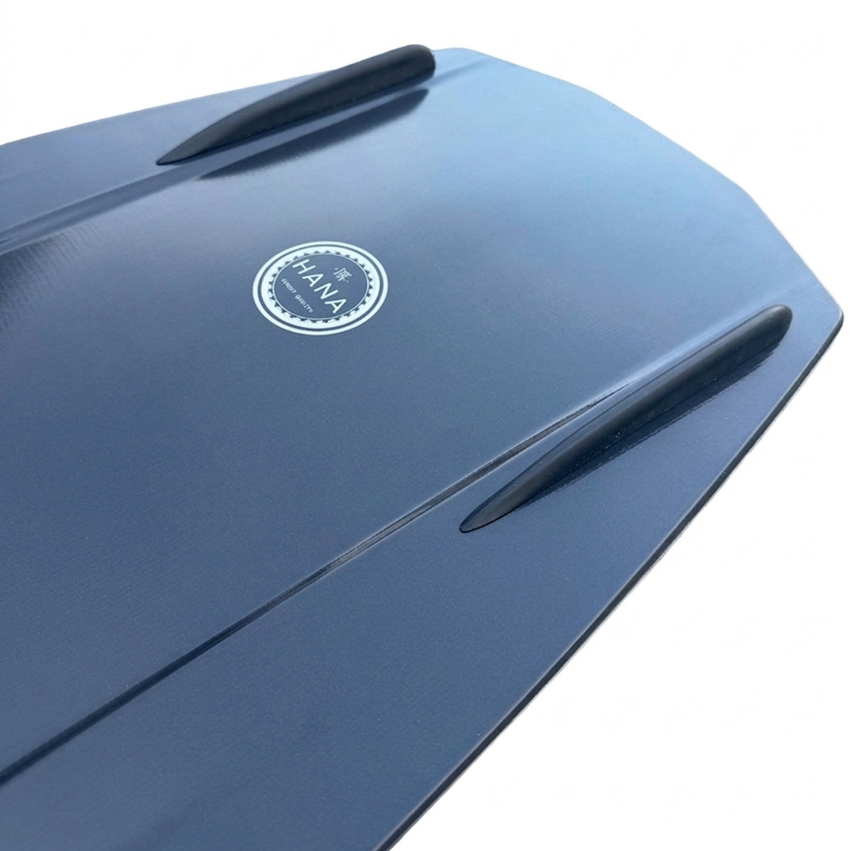 Detail of the fins under the HANA Carver wakeboard