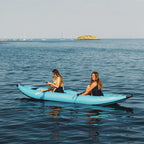 Blue HANA Cruiser 1/2P inflatable kayak – two people paddling at sea