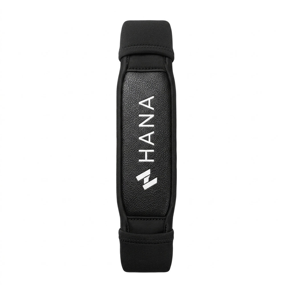 HANA Premium single ergonomic footstrap for wingfoil, black – top view with HANA logo
