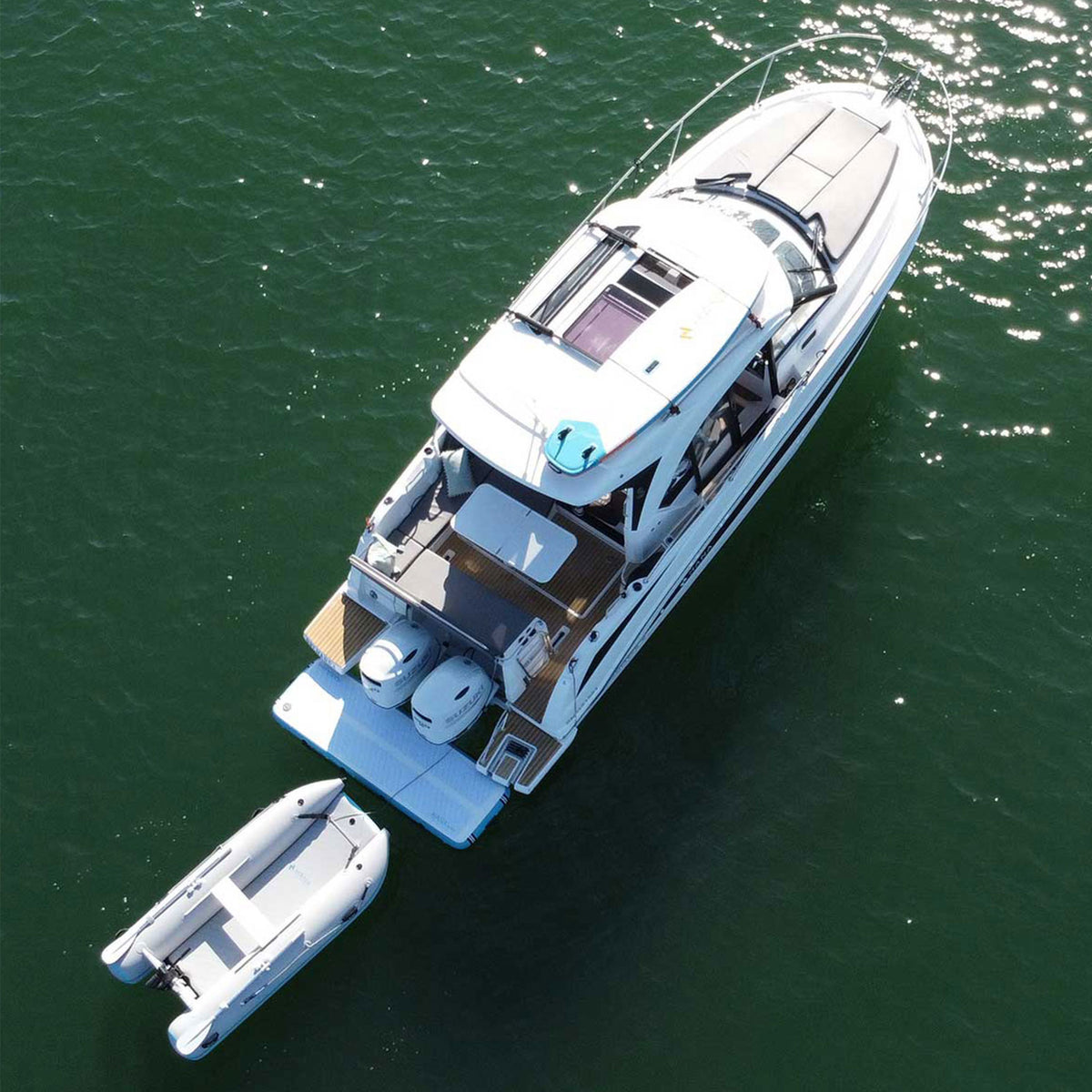 HANA Yachting inflatable gangway – used as a swim platform at the stern of a yacht, aerial view