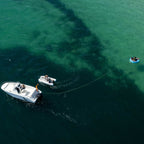 HANA Moon towable tube – aerial view, towed behind a boat