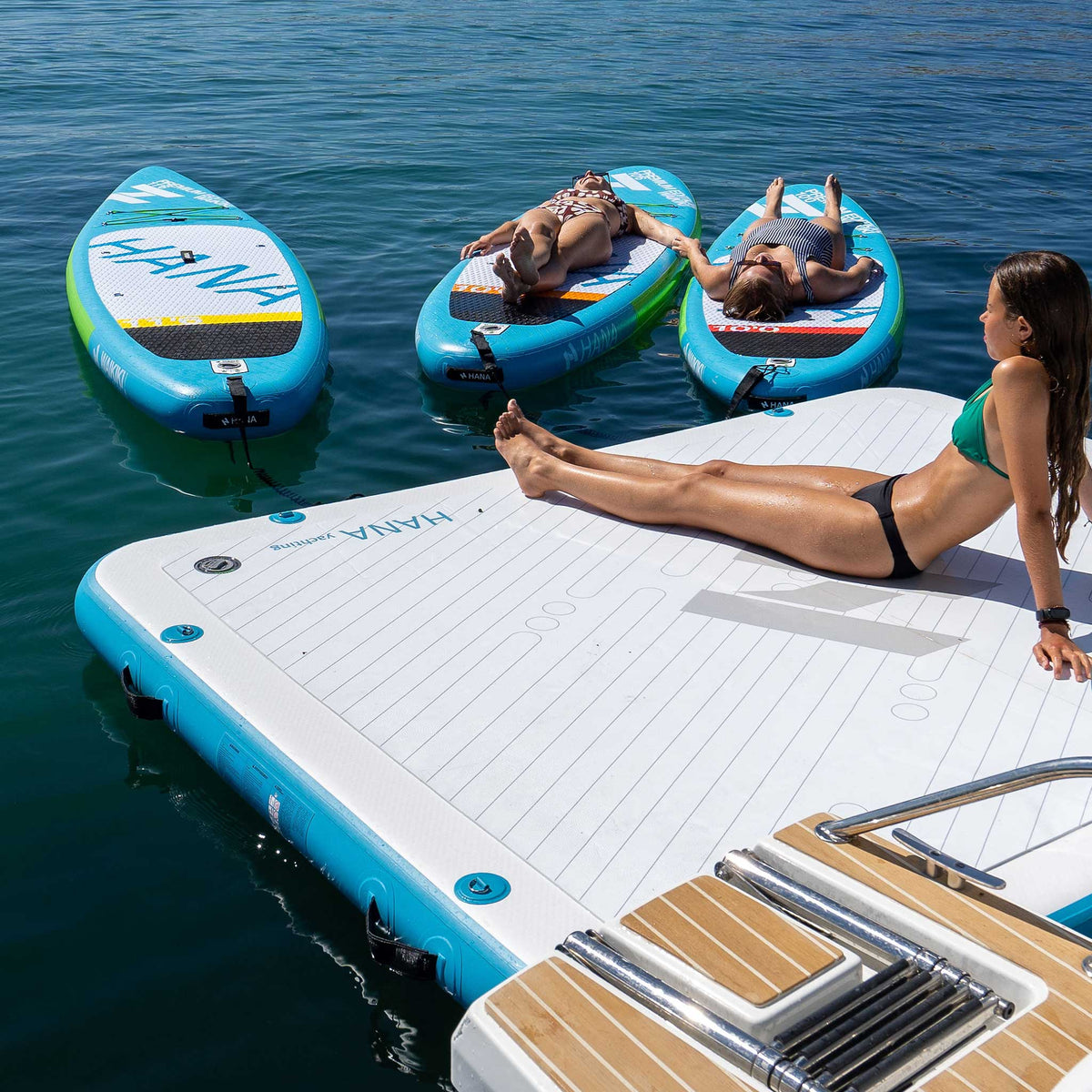 HANA Yachting inflatable platform – sunbathing at the stern of a boat