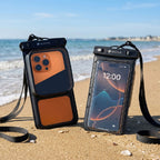 HANA waterproof pouches with accessory pocket on a beach