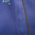 Combinaison néoprène HANA Waimea intégrale homme 4/3 mm coloris Navy – gros plan sur le logo HANA et le zip