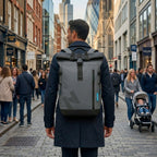 Man wearing the HANA XPlorer 25L backpack in Dark Grey in the city